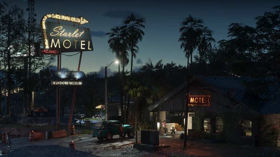 Starlet Motel neonreklámja pálmafák és éjszakai útépítés mellett